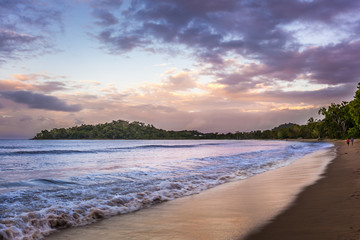 A beautiful beach of the Coral Coast at dusk, Queensland, Australia