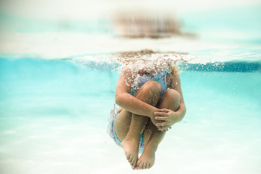 Child doing a cannonball