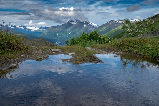 Small pond along the Trail of 98 off the Richardson Highway near Valdez Alaska. This was an original trail of the Klondike Gold Rush, and goes through mountains and glaciers © MelissaMN
