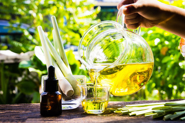 Lemongrass essential oil is placed on the table using a hand-drip oil lemongrass oil - spa and...