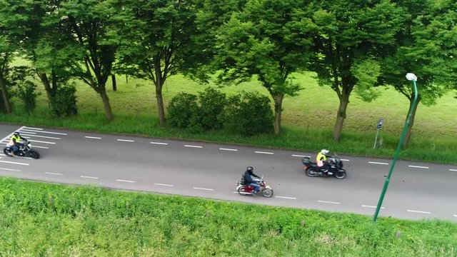 Aerial footage monkey bikes showing young people driving on these small and low-powered motorcycles made for convenience and ease of transportation their outstanding feature is a 50 four-stroke engine