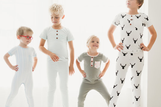 Blond siblings playing at home