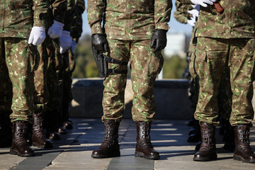 Army uniforms and boots © MoiraM