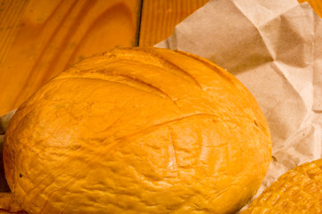 national Adyghe cheese homemade on a wooden table
