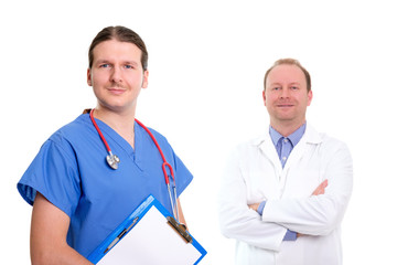 Portrait of young nurse or surgeon with doctor in the background. Isolated on white background. Healthcare concept