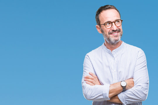 Middle Age Hoary Senior Man Wearing Glasses Over Isolated Background Smiling Looking Side And Staring Away Thinking.