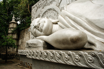 Reclining buddha statue at the Long Son Pagoda or Chua Long Son, a Buddhist temple in the city of Nha Trang in south Vietnam
