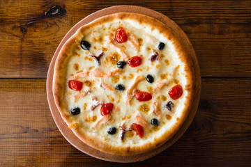 delicious pizza with meat, cheese and mushrooms	