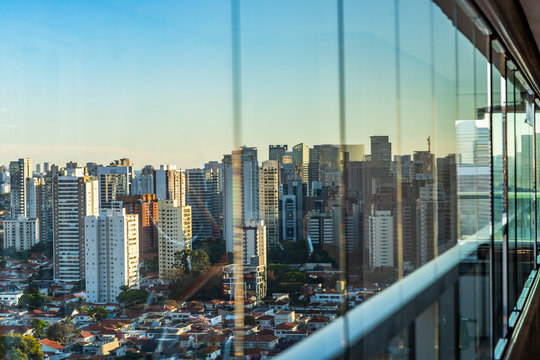 Fototapeta Seen through the window. City of Sao Paulo seen through the window, Brazil. 