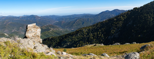 Panoramic view of the Regional Natural Park of Corsica, taken in central Corsica on the slopes of Monte Cardo looking out across Venaco and its local region out to the eastern coast in the distance.