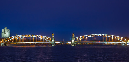 Bolsheokhtinsky bridge the Neva River in St. Petersburg at the blue hour and evening illumination