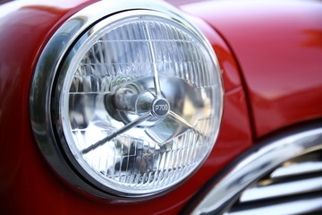 Red Car Headlights closeup shot