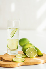 water with lime on a wooden board 