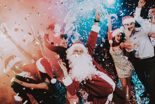 Man in Santa Claus Costume on New Year Party.