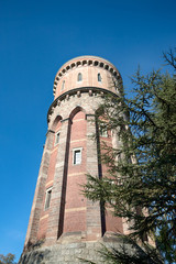 Fototapeta na wymiar Water tower and blue sky. Colmar, Alsace, France