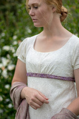 Regency woman in cream embroidered gown