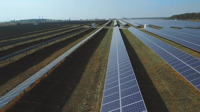 Large field of renewable solar energy. Shot on drone