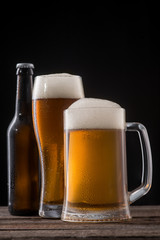 Bottle and glasses of beer
