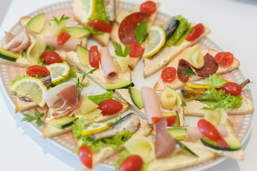 Catering banquet table with different food snacks 