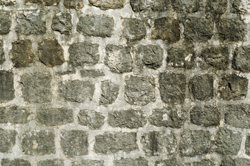 Background of old stone wall of ancient castle.