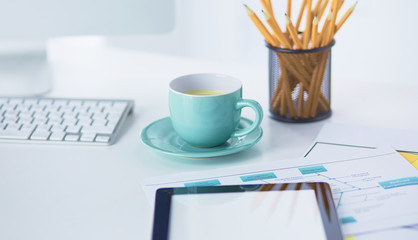 A cup of coffee on the office table