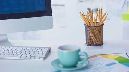 A cup of coffee on the office table
