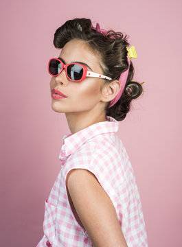 beauty salon and hairdresser. retro woman with fashion makeup. happy girl in summer glasses. Pin up girl. vintage housewife woman make hairstyle. Beauty and fashion. She got great style