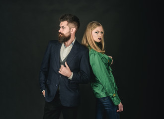 Confident in their choice. Fashion couple of sexy woman and bearded man. Enjoying friendly relations. Autumn street style. Love relations. Autumn fashion trends. Couple in love in fashionable style