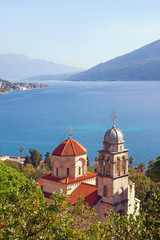 Fototapeta na wymiar Beautiful Mediterranean landscape. Montenegro, Adriatic Sea. View of Savina Monastery and Bay of Kotor near Herceg Novi city
