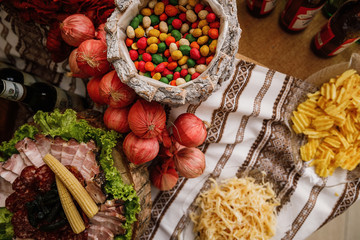 Catering banquet table with different food snacks and appetizers