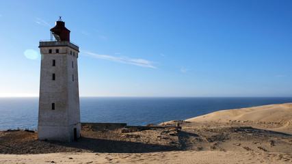 Fototapeta na wymiar lighthouse on the beach