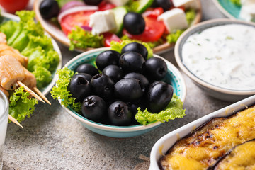 Black olives  and traditional greek dishes