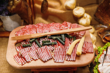 Catering banquet table with different food snacks and appetizers