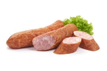 German specialty salami. Hard cured sausage with lettuce, Close-up, isolated on a white background.