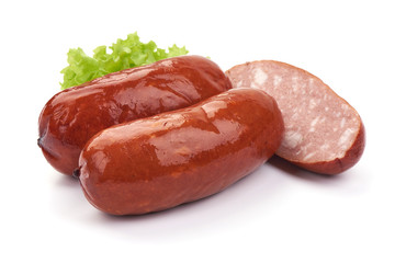 Oktoberfest Grilled Sausages with lettuce. Isolated on a white background. Close-up