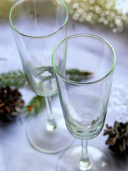 Empty champagne glasses on the table. Cooking for a festive dinner. Christmas or New Year. Festive concept
