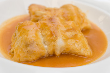 Merluza a la sidra, hake in cider sauce, spanish typical food