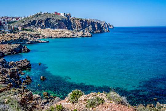 Beautiful background of a Moroccan  beach with waves and sea in summer in Al hoceima