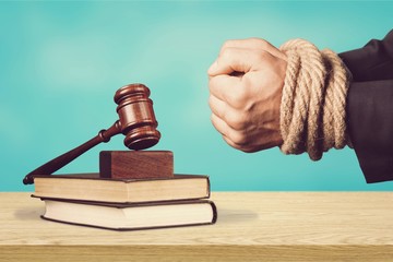Close-up of businessman hands with rope on background
