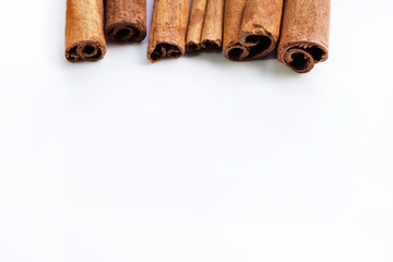 Cinnamon sticks isolated on white