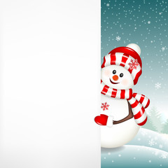 Christmas snowman with white blank isolated on winter background.