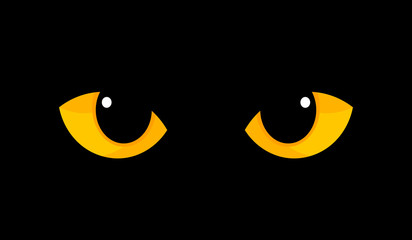 Yellow cat eyes in darkness © Studio Barcelona