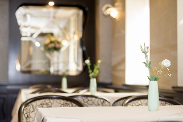 Selected focus empty brown wooden table and Coffee shop or restaurant blur background with bokeh image. for your photomontage or product display