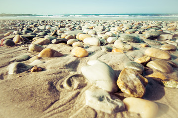 Fototapeta na wymiar stones and sea, travel conceptual photography, wallpaper
