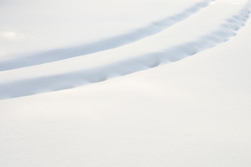 Fototapeta na wymiar Tracks in fresh snow