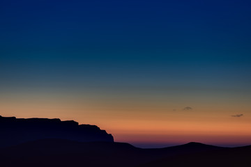The sky at sunset over the hills in the foothills of the North Caucasus in Russia.