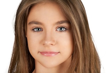Naklejka premium Portrait of a Smiling Young Girl