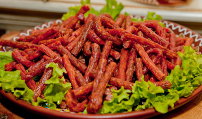 hunting sausages with salad on a plate
