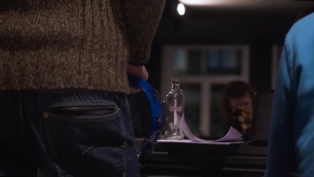 Close up footage of a blue tambourine