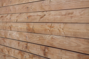 Obraz premium The varnished boards. The wooden textured background. The vertical plank